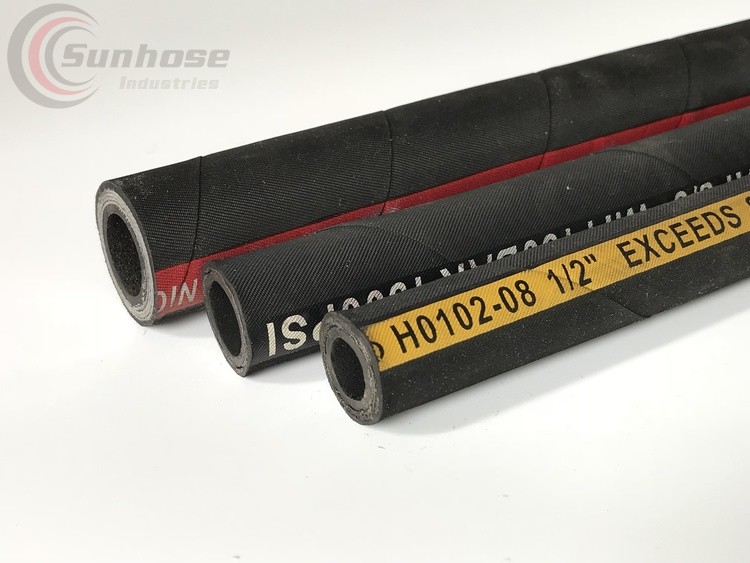 Range of industrial rubber hoses including hydraulic, air, water and oil transfer hoses